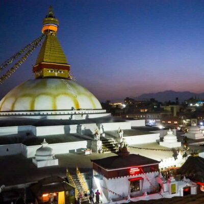 Boudha Stupa at dusk from a nearby rooftop restaurant