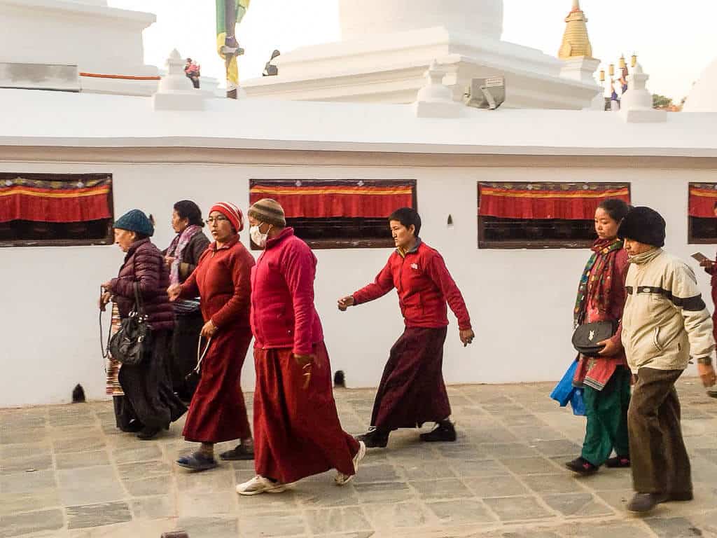 Worshipers walking around Boudha Stupa