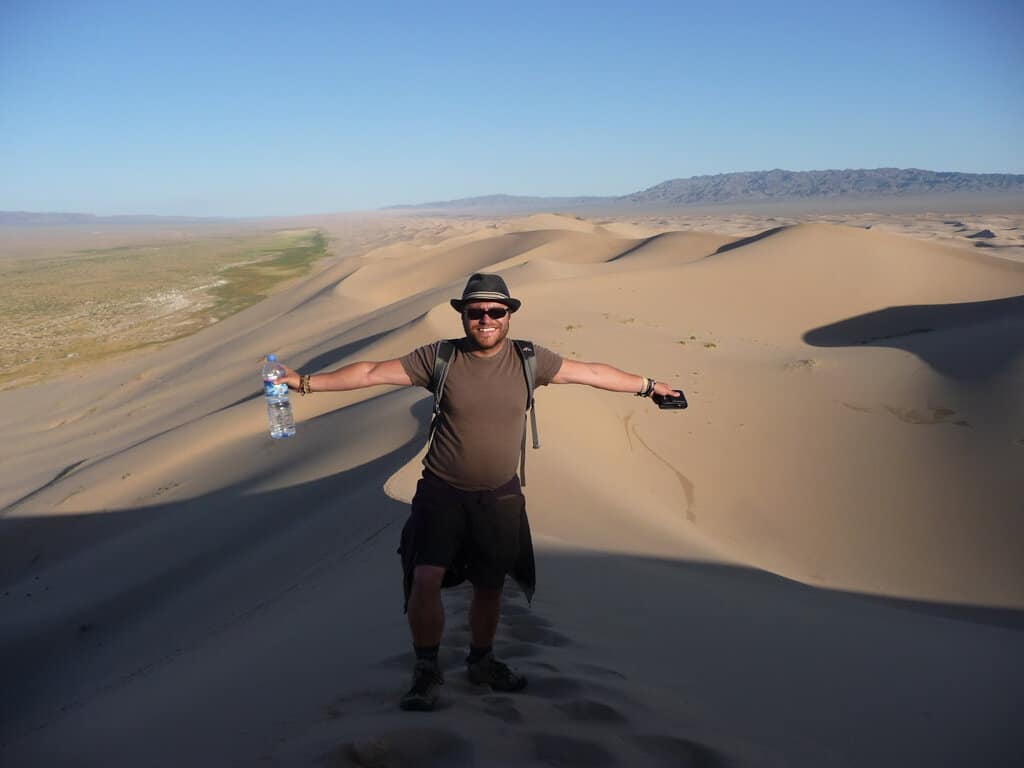 Climbing The Sand Dunes In The Gobi Desert Mongolia